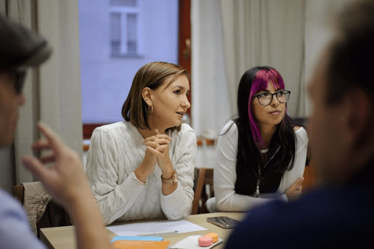 Students talking together during language class